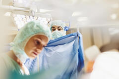 Doctors in a surgery room. 
