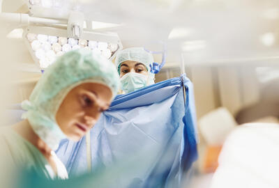 Doctors in a surgery room. 
