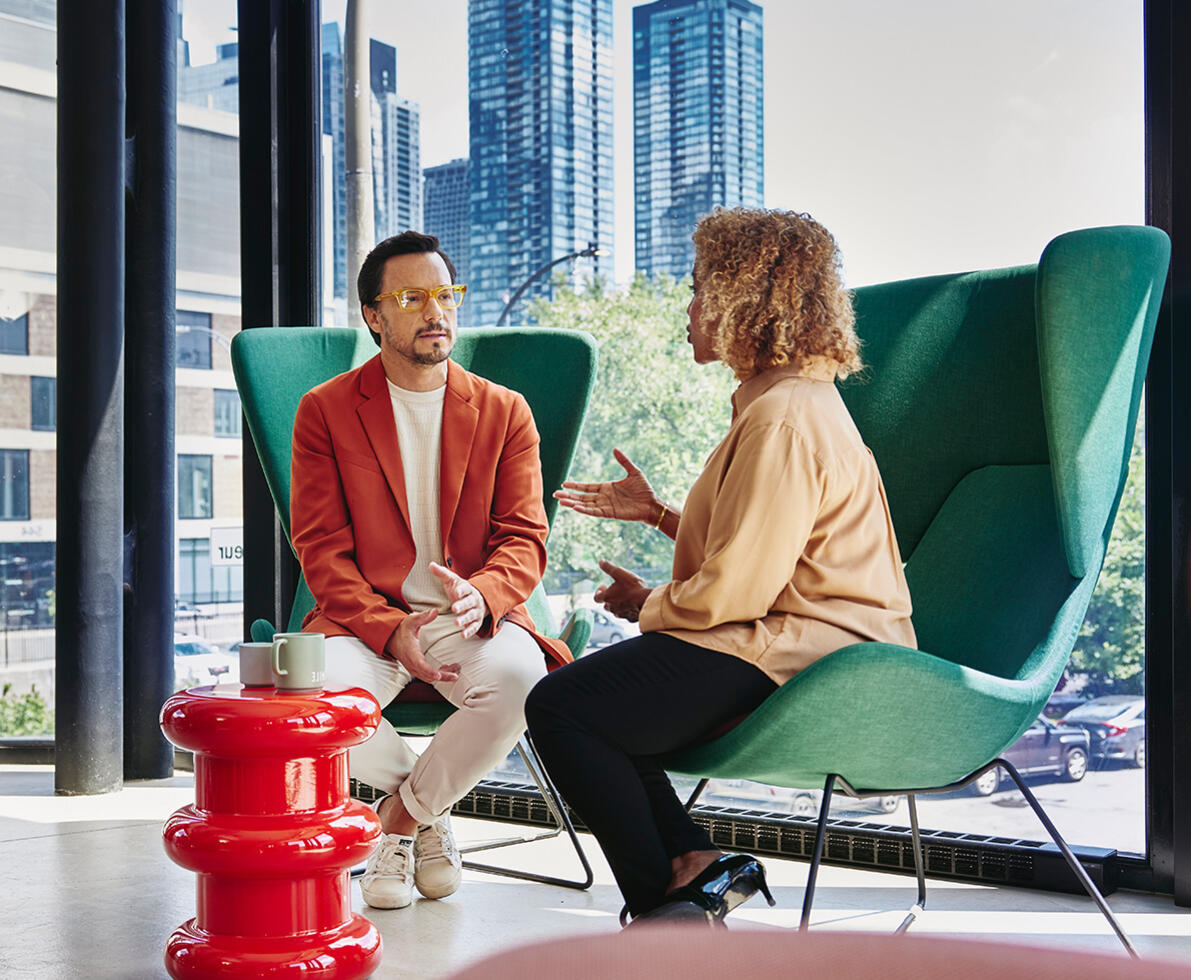 two colleagues talking in the office