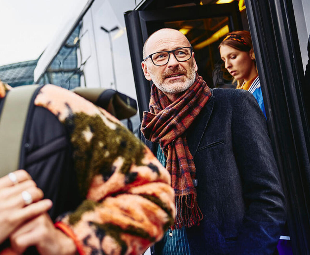 man walking with headphones