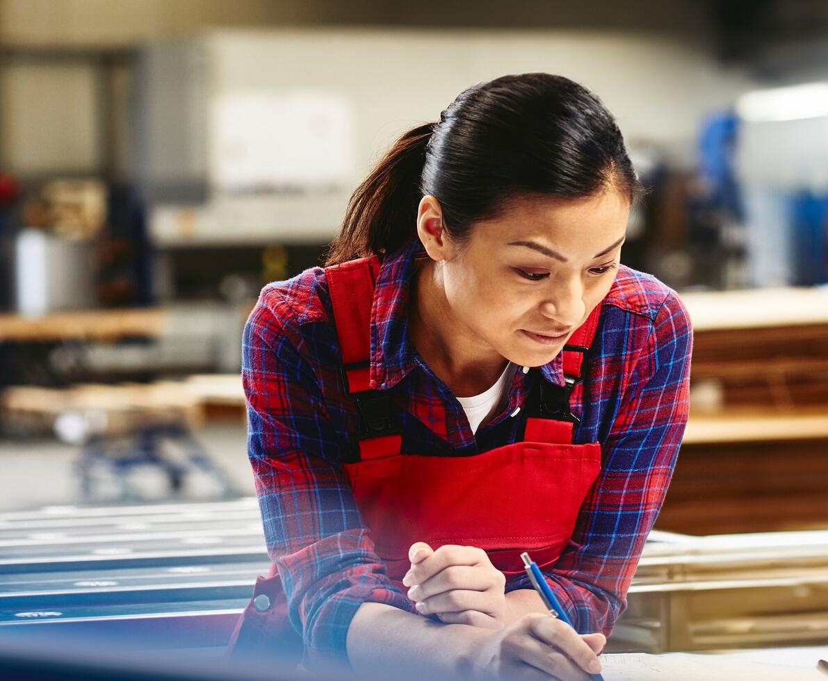 image of woman working in manufacturing