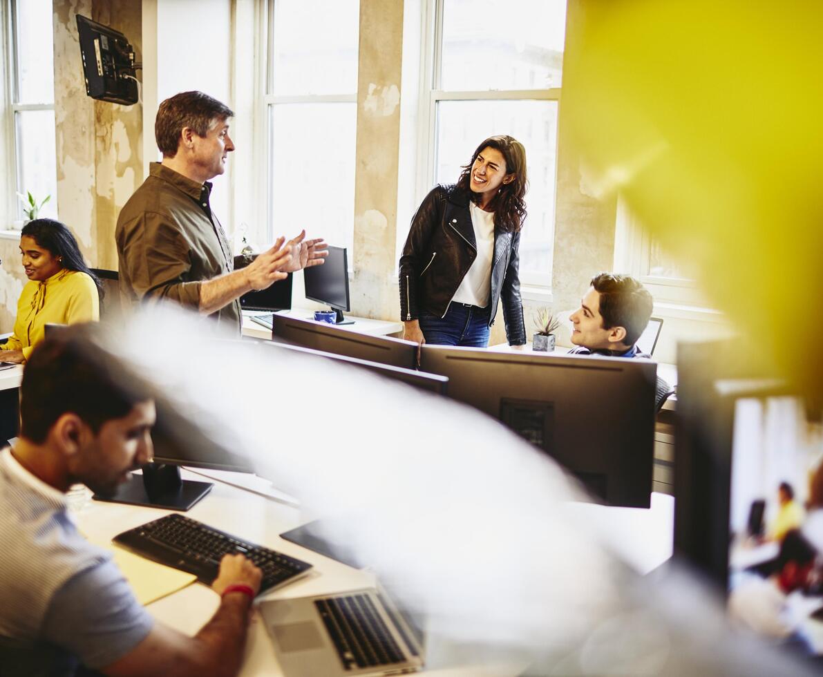 Group in an office having a conversation