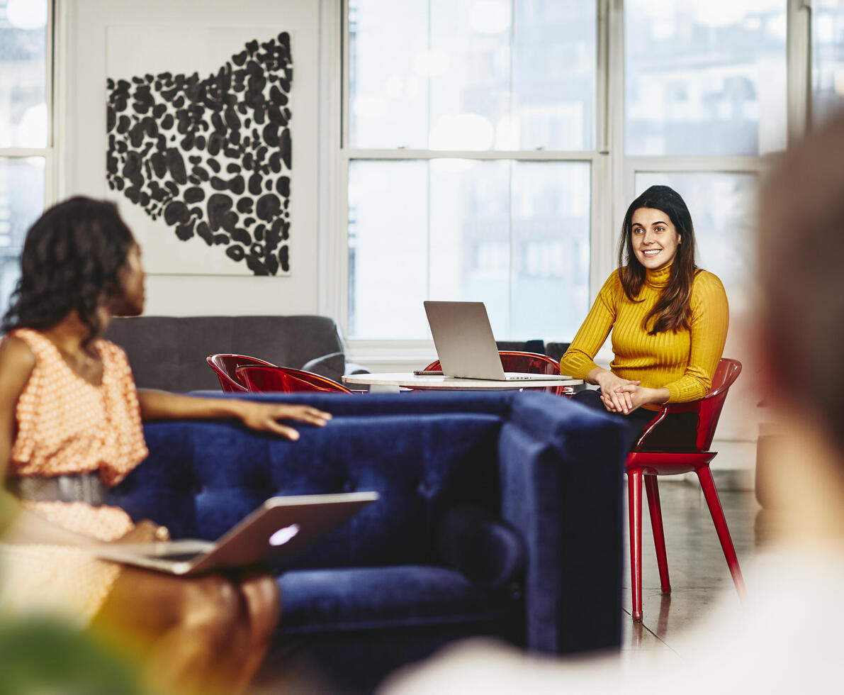 Two female having a conversation
